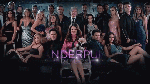 A Group Of People Posing For A Picture With The Word Nderruin In The Corner GIF