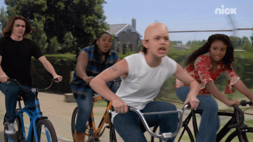 A Group Of People Riding Bicycles With A Nick Logo In The Corner GIF