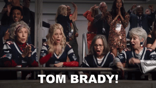 A Group Of People Sitting In A Stadium With Tom Brady Written In The Corner GIF