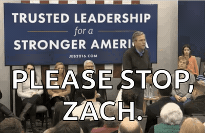 A Group Of People Sitting In Front Of A Banner That Says Trusted Leadership For A Stronger America GIF