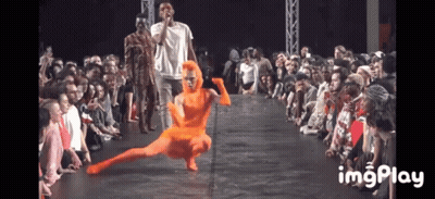 A Group Of People Sitting In Front Of A Stage With The Word Imgplay On The Bottom Right GIF