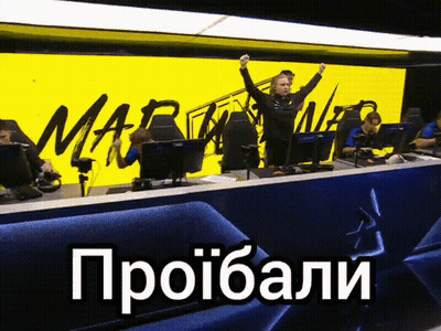 A Group Of People Sitting In Front Of A Yellow Sign That Says Mar GIF