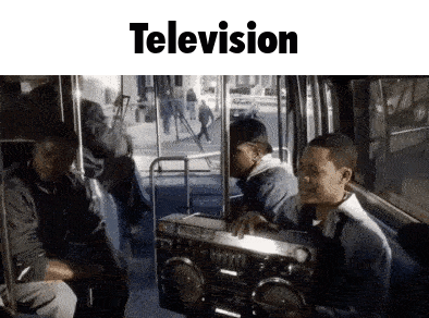 A Group Of People Sitting On A Bus Holding A Boombox With The Word Television Above Them GIF