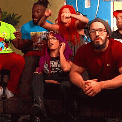 A Group Of People Sitting On A Couch With One Wearing A T-Shirt That Says ' Ecg ' GIF