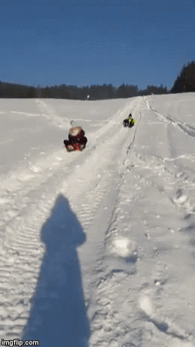 A Group Of People Sledding Down A Snowy Hill With Imgflip.com At The Bottom Of The Image GIF