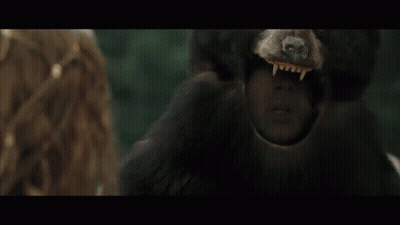 A Group Of People Standing In A Circle Wearing Masks GIF