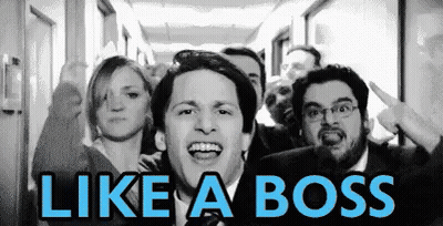 A Group Of People Standing In A Hallway With The Words Like A Boss Written On The Bottom GIF