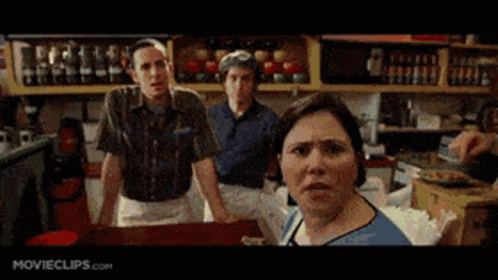 A Group Of People Standing In A Kitchen With Movieclips.com On The Bottom GIF