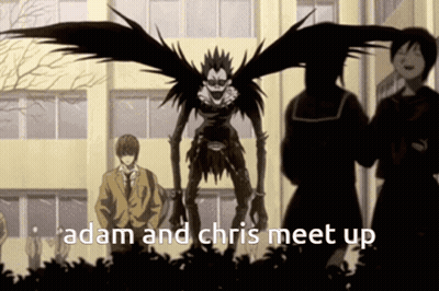 A Group Of People Standing In Front Of A Building With The Words " Adam And Chris Meet Up " GIF