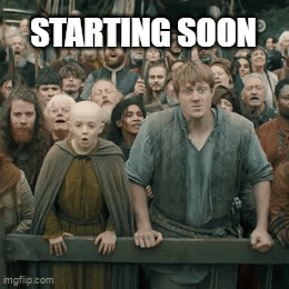 A Group Of People Standing In Front Of A Fence With The Words " Starting Soon " Above Them GIF