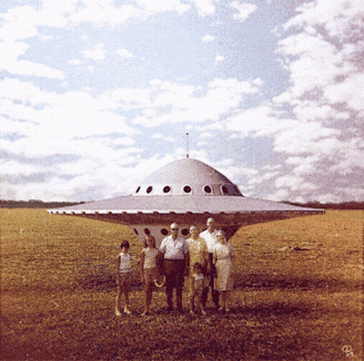 A Group Of People Standing In Front Of A Flying Saucer With The Letter R On The Bottom Right GIF