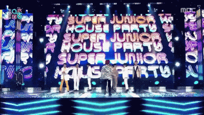 A Group Of People Standing In Front Of A Large Screen That Says " Super Junior House Party " GIF