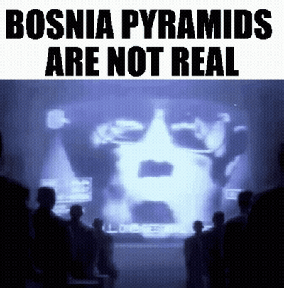 A Group Of People Standing In Front Of A Projector Screen That Says Bosnia Pyramids Are Not Real GIF
