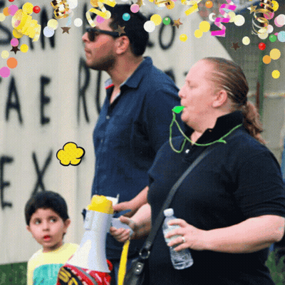 A Group Of People Standing In Front Of A Sign That Says " Ae " On It GIF