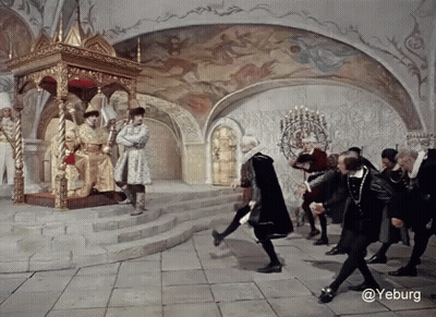 A Group Of People Standing In Front Of A Throne With The Word Yeburg On The Bottom Right GIF