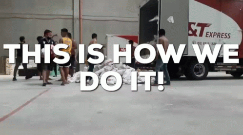 A Group Of People Standing In Front Of A Truck That Says St Express GIF
