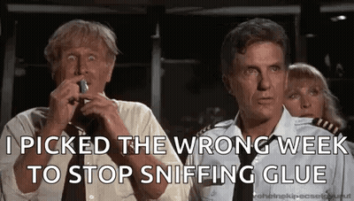 A Group Of People Standing Next To Each Other On A Plane . GIF