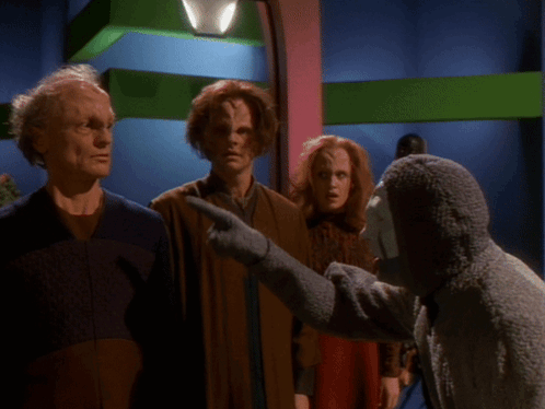 A Group Of People Standing Next To Each Other With A Caption That Says He 'S Already Banned Two Of Our Colleagues GIF