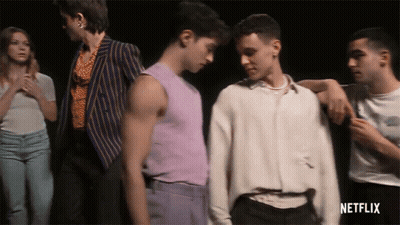 A Group Of People Standing Next To Each Other With Netflix Written On The Bottom Right GIF