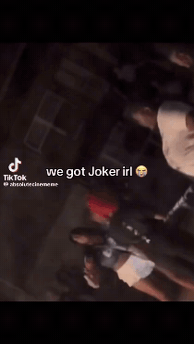 A Group Of People Standing Next To Each Other With The Caption " We Got Joker Irl " On The Bottom GIF