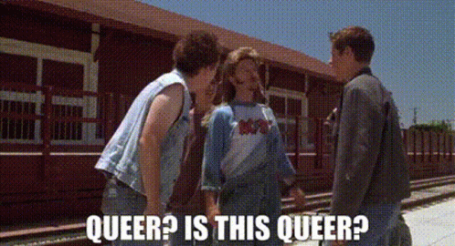 A Group Of People Standing Next To Each Other With The Words Queer Is This Queer Written On The Bottom . GIF