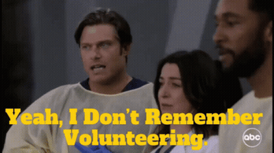 A Group Of People Standing Next To Each Other With The Words Yeah I Do N't Remember Volunteering GIF
