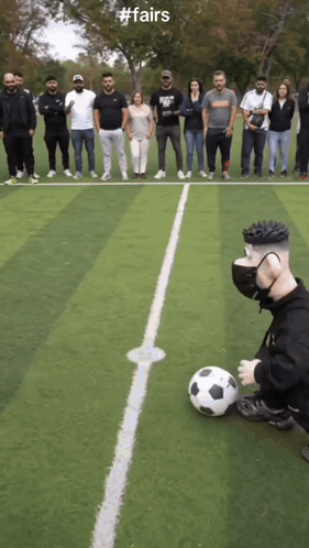 A Group Of People Standing On A Soccer Field With #Fairs Written On The Top GIF