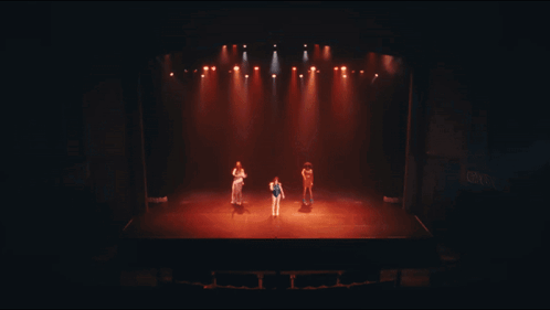 A Group Of People Standing On A Stage In Front Of A Sign That Says ' Cnn ' On It GIF