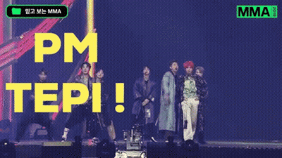A Group Of People Standing On A Stage With The Words Pm Tepi Written In Yellow Letters GIF