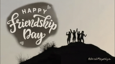 A Group Of People Standing On Top Of A Hill With The Words Happy Friendship Day Written Above Them GIF