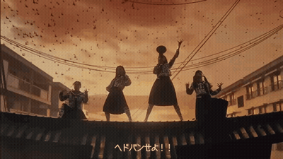 A Group Of People Standing On Top Of A Roof With Birds Flying Around Them GIF