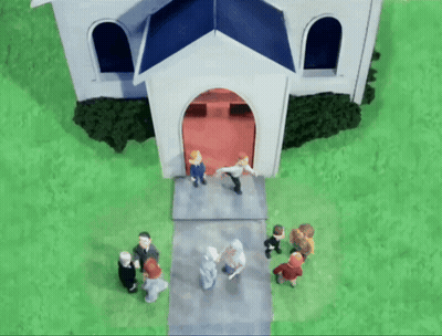 A Group Of People Standing Outside Of A White Church GIF