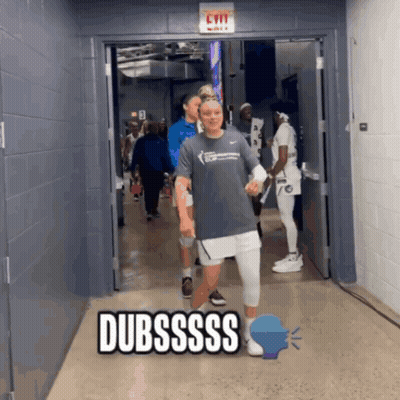 A Group Of People Walking Down A Hallway With The Word Dubssss On The Bottom GIF