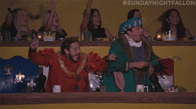 A Group Of People Watching A Sunday Night Fallon GIF