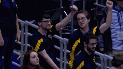 A Group Of People Wearing Blue And Yellow Shirts With The Letters Vc On Them GIF