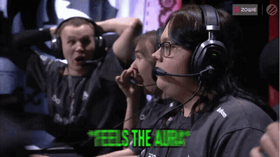 A Group Of People Wearing Headphones With The Words " Feels The Aura " On The Bottom GIF