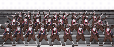 A Group Of People Wearing Sunglasses Are Dancing In A Line GIF
