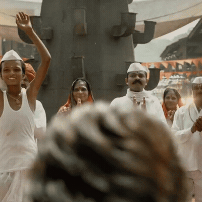 A Group Of People Wearing White Shirts And Hats Are Dancing GIF