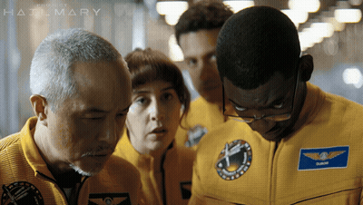 A Group Of People Wearing Yellow Uniforms With A Patch That Says Oliver On It GIF