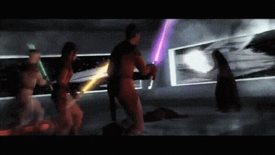 A Group Of People With Lightsabers In A Dark Room GIF