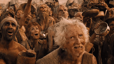 A Group Of People With Their Mouths Open Including An Elderly Man With Gray Hair GIF