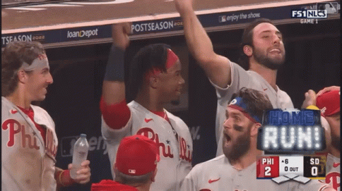 A Group Of Philadelphia Phillies Baseball Players Celebrate A Home Run GIF