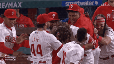 A Group Of Philadelphia Phillies Baseball Players Celebrate A Win GIF