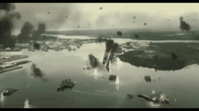 A Group Of Planes Are Flying Over A Body Of Water .. GIF