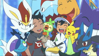 A Group Of Pokemon Are Posing For A Picture With A Boy Wearing A Shirt That Says A On It GIF