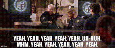 A Group Of Police Officers Are Standing In Front Of A Sign That Says Yeah Yeah Yeah GIF