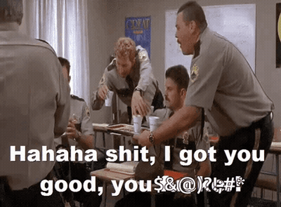 A Group Of Police Officers In A Classroom With The Words " Hahaha Shit I Got You Good " GIF