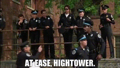 Police Officers Standing On Balcony GIF