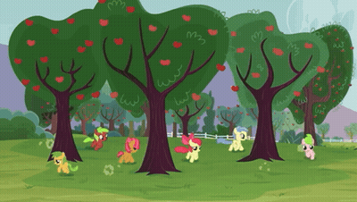 A Group Of Ponies Are Standing Around Trees In A Field GIF