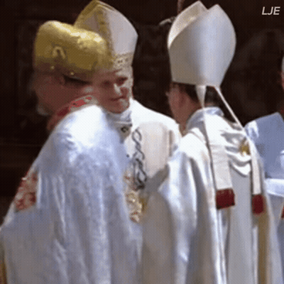 A Group Of Priests Standing Next To Each Other With Lje Written On The Bottom Right GIF